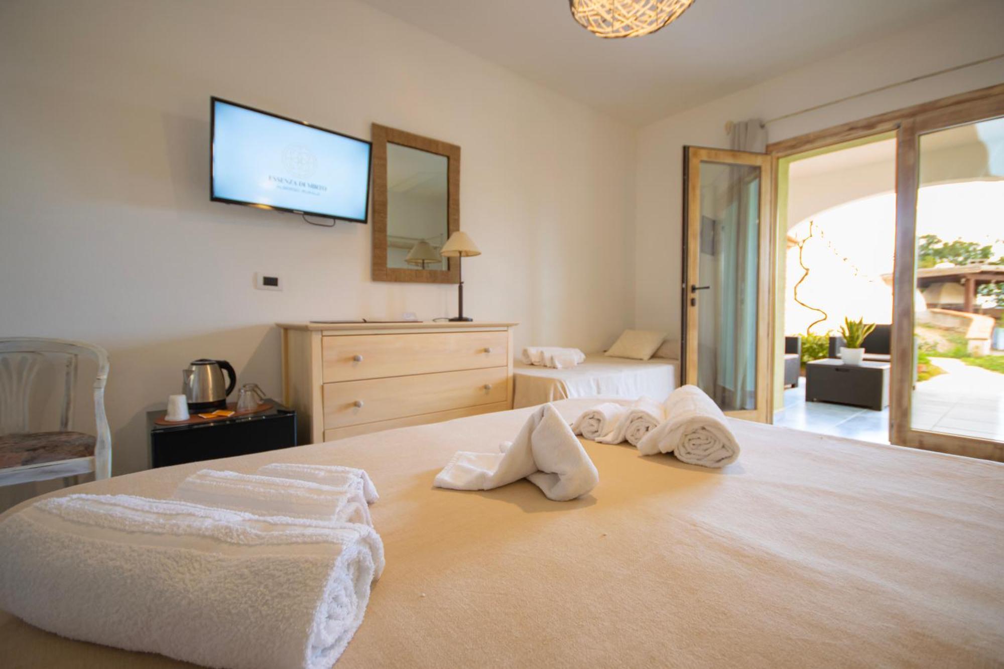 Hotel Essenza Di Mirto La Caletta Zimmer foto