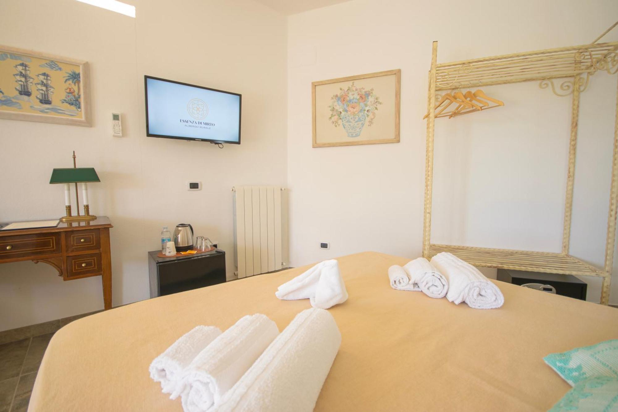 Hotel Essenza Di Mirto La Caletta Zimmer foto